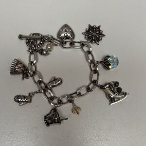 Charming Silver Bracelet with Pink and Pearl Accents featuring winter charms.